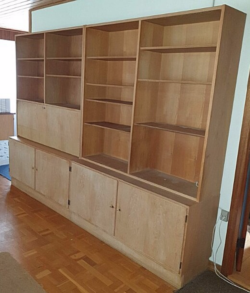 Hundevad & Co.  Bookshelf unit in light Oak with two cabinets, a chest of drawers and three matching sections with shelves