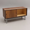 Document Cabinet in Walnut on chromed steel legs and with lock. Mid-20th century.